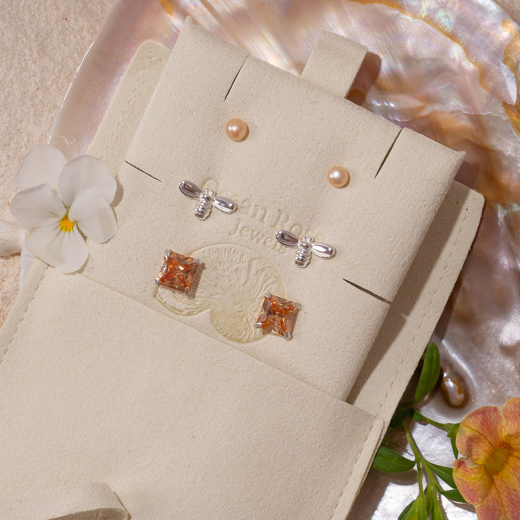 A dreamy set of stud earrings inspired by warm Spring days.