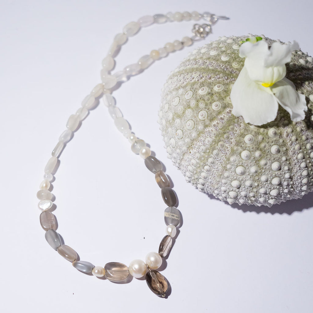 A beautiful mix of shimmer and sparkle with misty moonstone and faceted smoky quartz this is a beautiful and enchanting necklace.