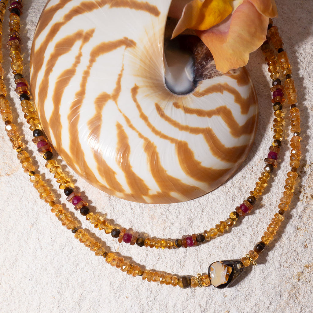 This radiant gemstone & opal bead necklace features saturated golden hues and a unique boulder opal feature bead.