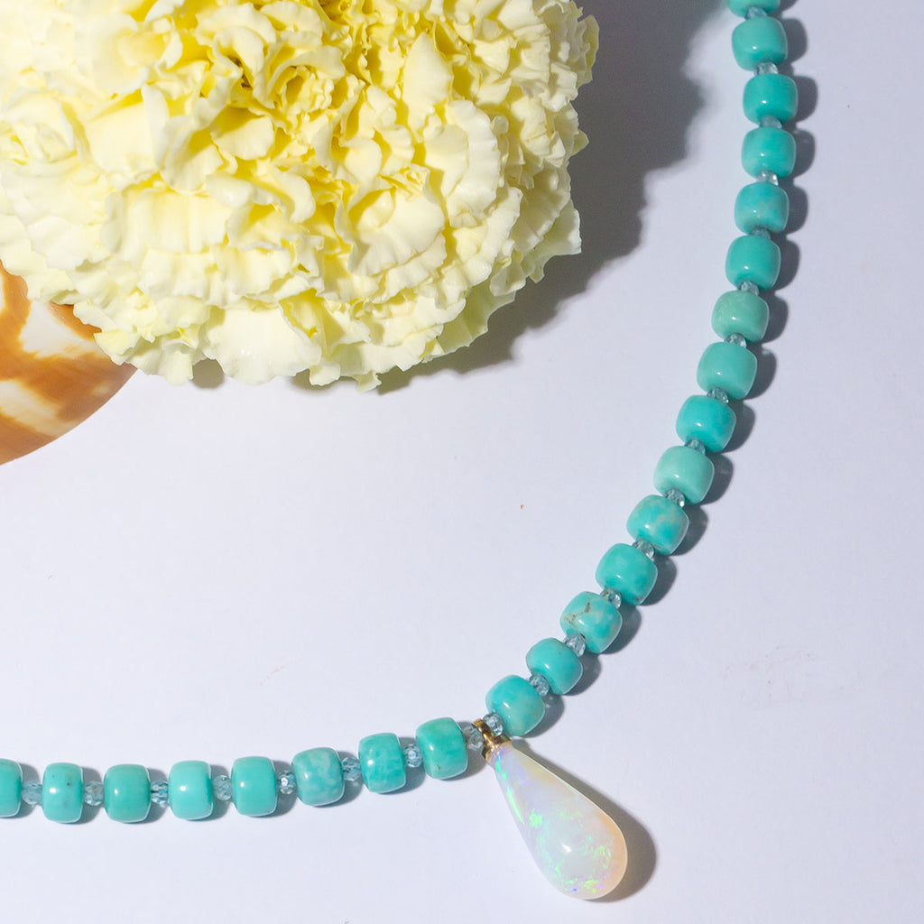 Discover the shimmering beauty of our Necklace Gemstone Hidden Waterfall. Featuring a stunning crystal opal droplet pendant with a magical rainbow of colour play. 