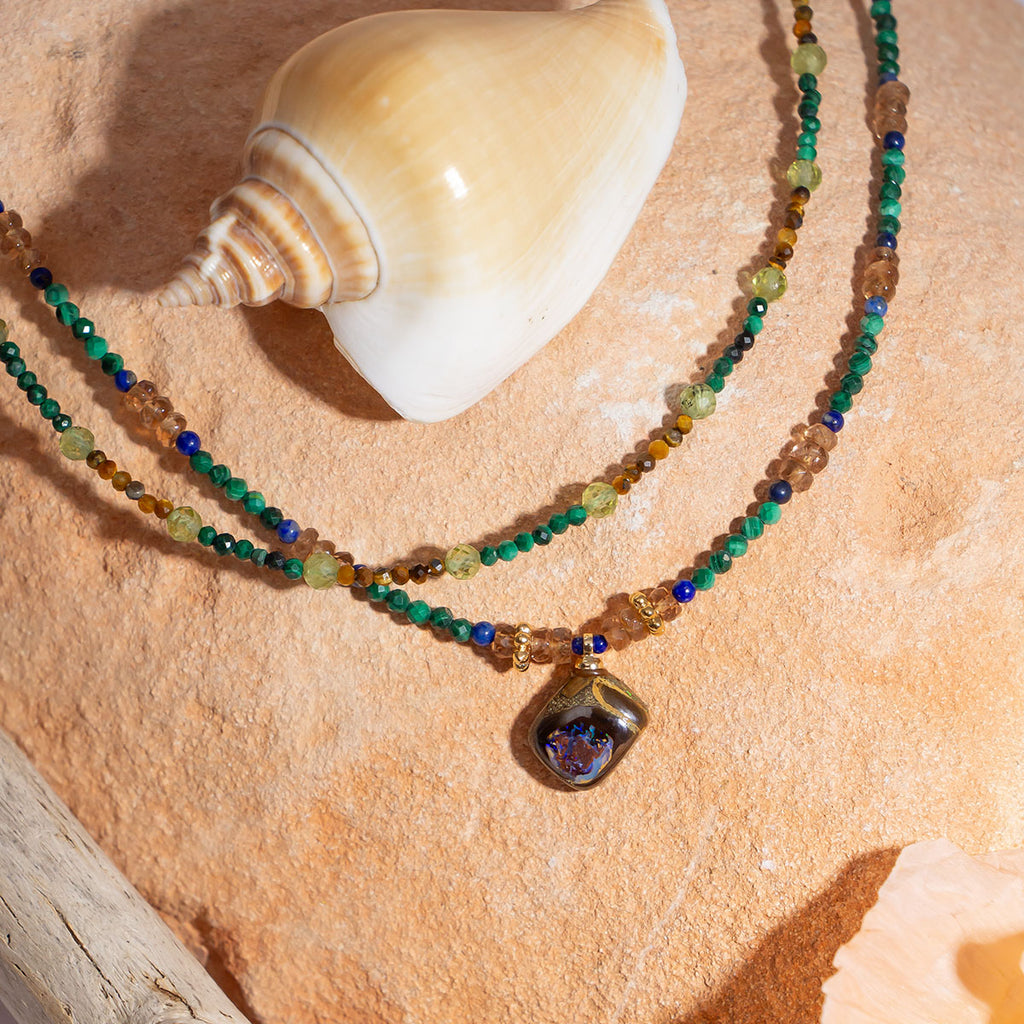 Like a relic from a world lost to the jungle this beautiful necklace will enchant you with its magic.