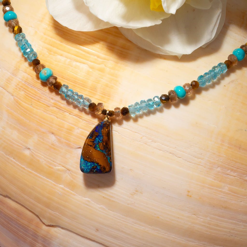 Get lost in the beautiful shimmering blues & green of this Australian Solid Boulder Opal.