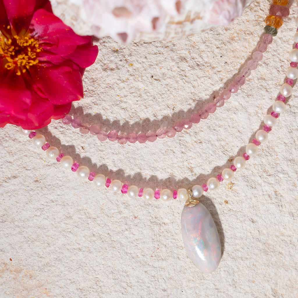 This delicate pearl, opal & spinel necklace is an enchanting piece.