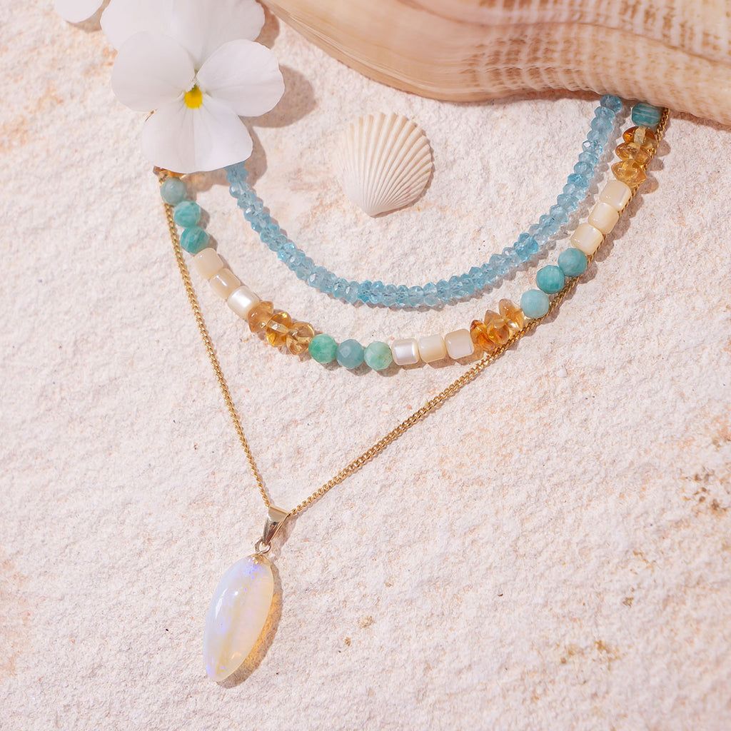 This necklace will have you dreaming of soft sea breezes, warm golden sands and cool aqua waters.