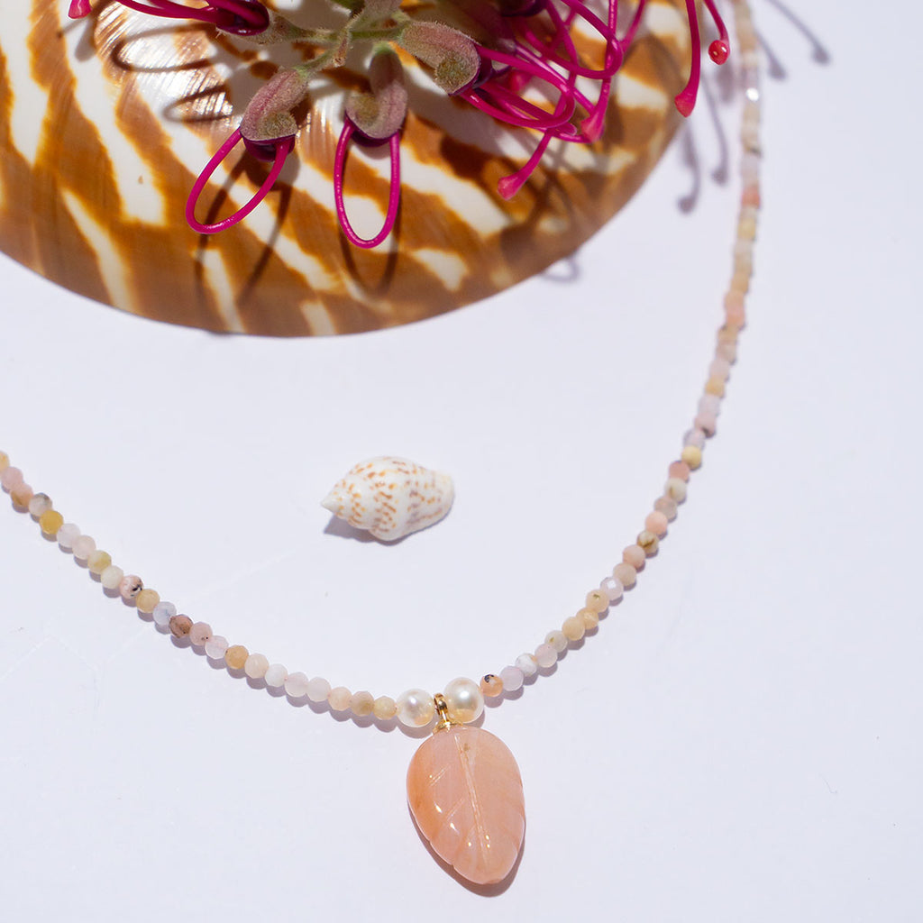 Little darling so subtle and pretty, palest pink Agate hand carved into a leaf and strung on the tiniest pink Opal beads. This is divine.