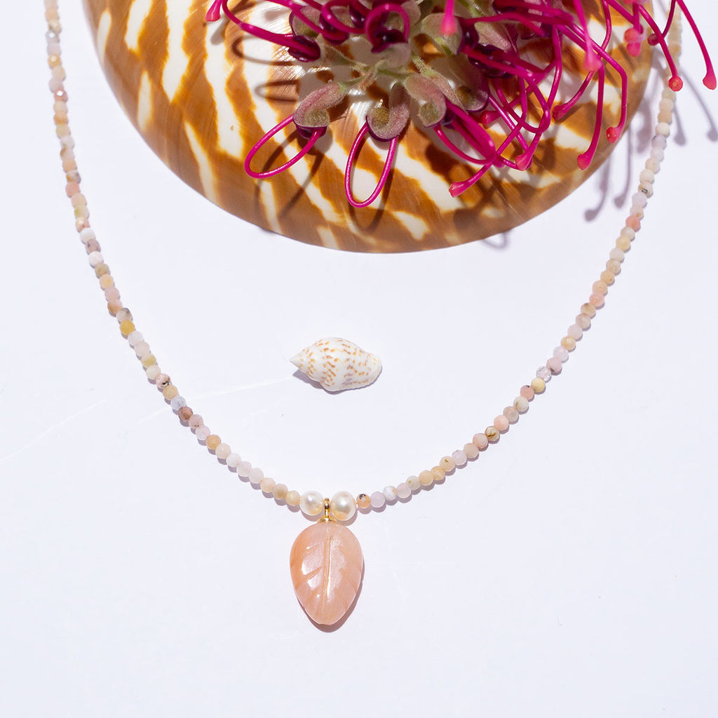 Little darling so subtle and pretty, palest pink Agate hand carved into a leaf and strung on the tiniest pink Opal beads. This is divine.