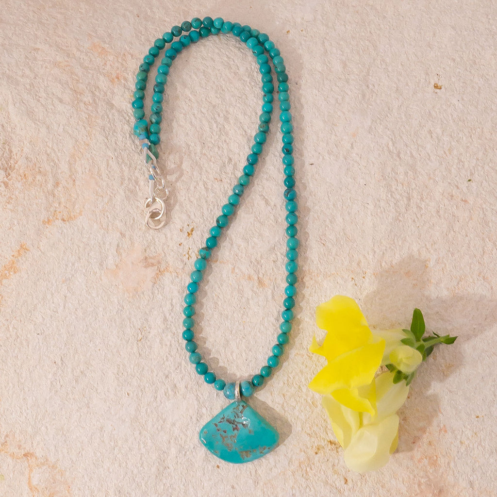 Like the clears waters of a beach in the Pacific Ocean this beautiful natural turquoise necklace is cool & bright.