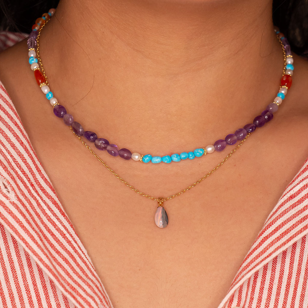 Be the happiest person in the room, our Inez gemstone necklaces bring a joyous tumble of colourful gemmy stones.