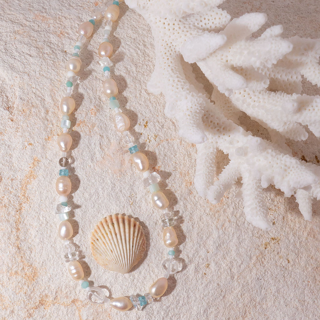 Tiny aqua drops on a tropical island lagoon, luminescent creamy white pearls with wave drops of palest blue Aquamarine and Amazonite beads, feel the calm of the islands.