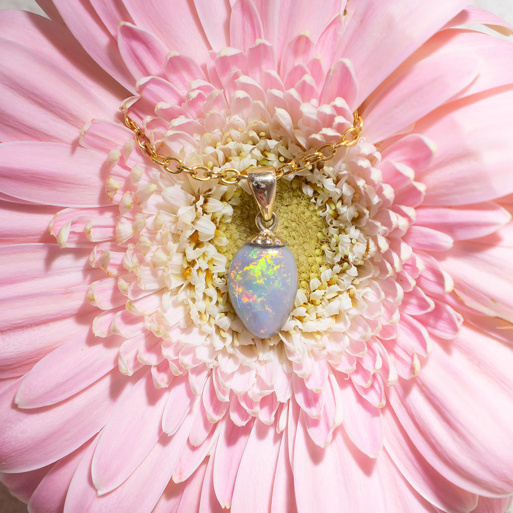 This gorgeous Australian Opal is awash with a rainbow of shimmering colours.