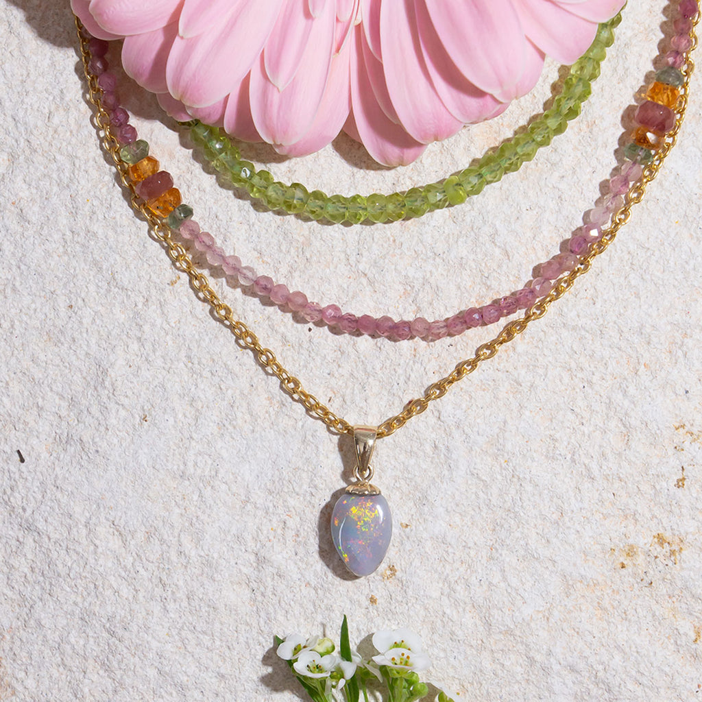 This gorgeous Australian Opal is awash with a rainbow of shimmering colours.